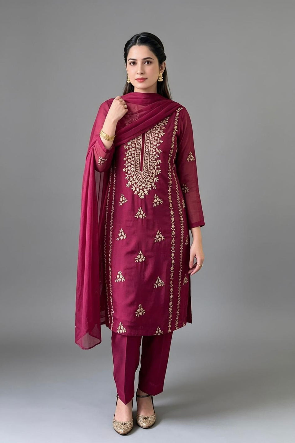 A beautifully crafted three-piece  suit, handmade with intricate gota work for an elegant, traditional finish....
